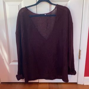 Light knit oversized sweater with deep V